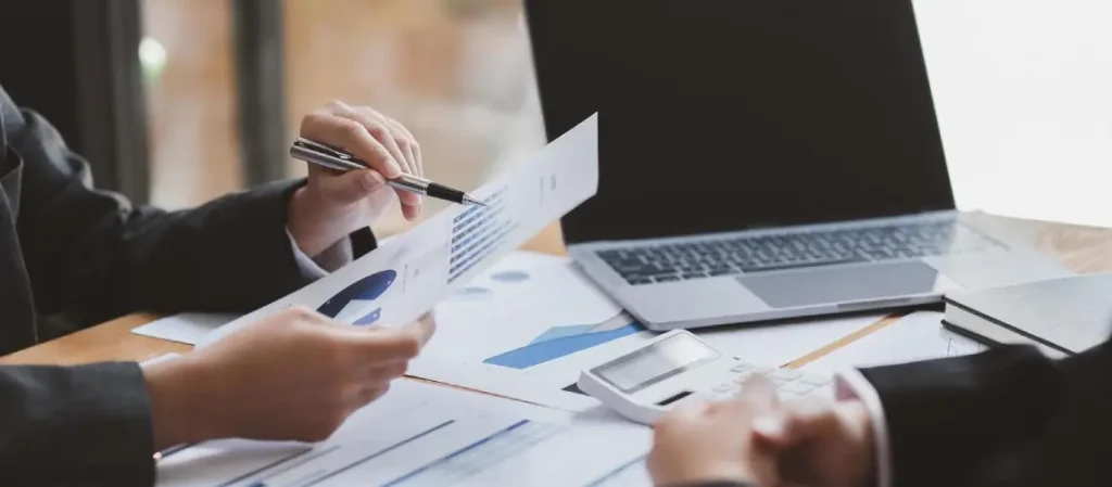 A business valuation expert in Tasmania discussing reports with a client